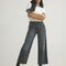 model wearing washed charcoal high rise cropped leg jeans