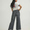 back view of model wearing washed charcoal high rise cropped leg jeans