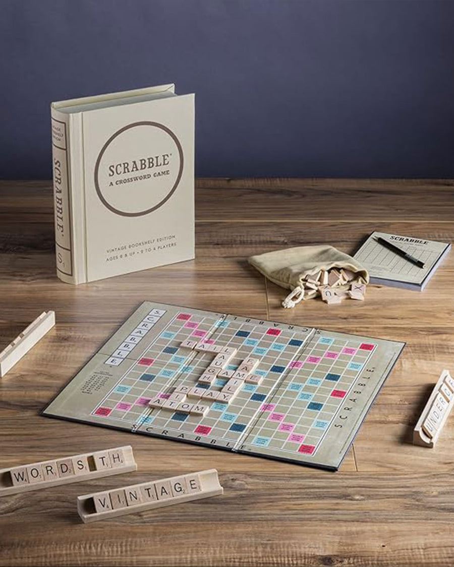 game and pieces in vintage scrabble game with bookshelf cover