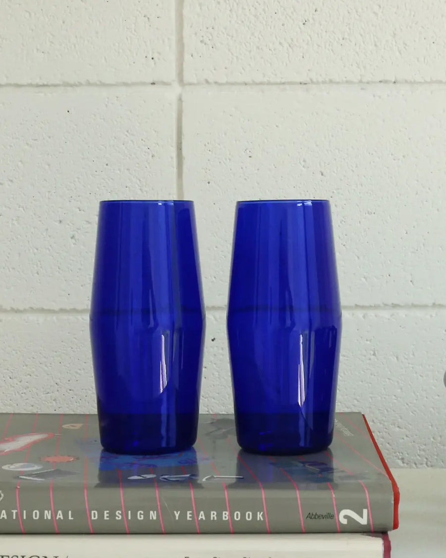 set of 2 Century Cobalt Glass Set - 16 oz. on a book