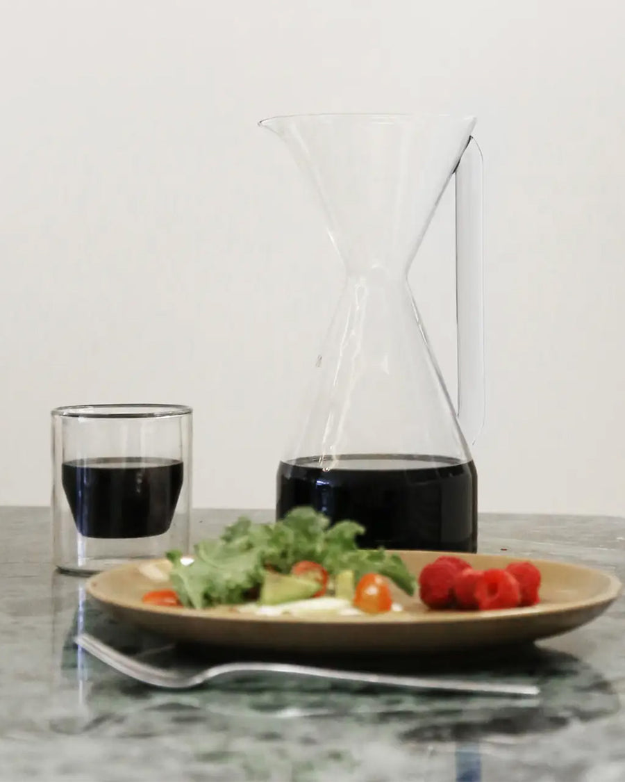 Clear Pour Over Carafe on a table with matching glass