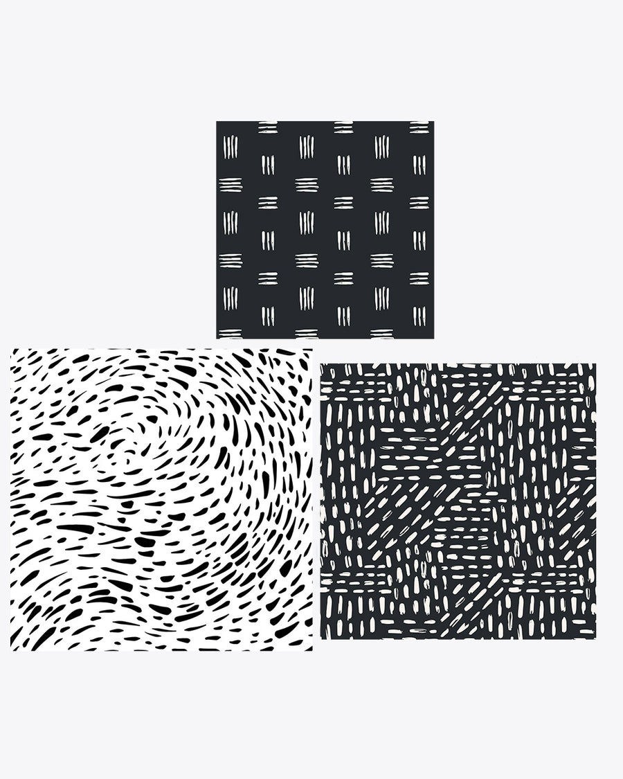 set of 3 reusable wraps: small - black ground with triple white line, medium - black ground with white brushstroke, and large white with black swirl brushstroke