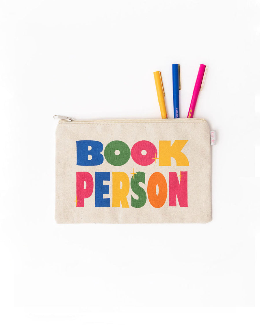 tan pouch with colorful 'book person' across the front with pens inside