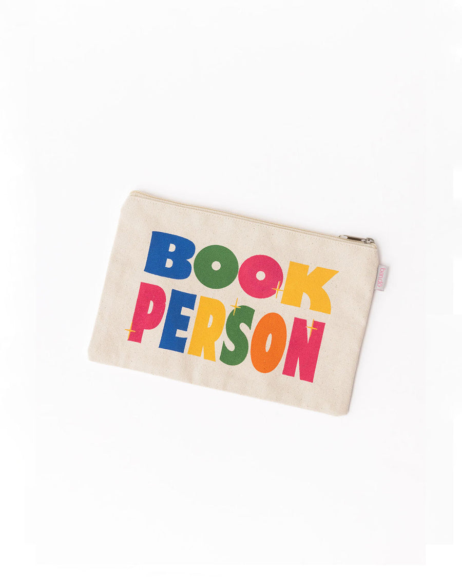 tan pouch with colorful 'book person' across the front