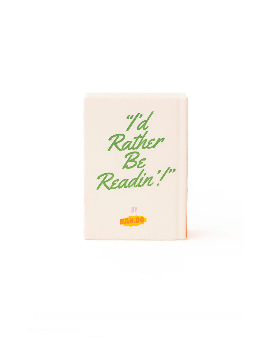 back view of book shaped de-stress ball with 'i'd rather be readin'!' across the front