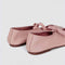 back view of ballerina pink tie ballet flat
