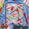 light blue to-do planner with colorful art supplies graphics scattered on the front