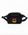side view of black fanny pack with strawberry eyes and banana smiley design