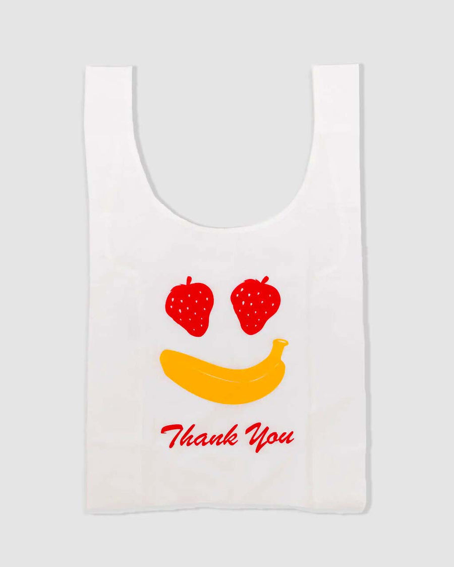 white standard baggu with fruit smiley (strawberry eyes and banana smile) with red 'thank you'
