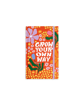 17-month classic planner with red ground, colorful abstract flowers and white 'grow your own way' text across the front