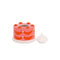 pink and red cake shaped match holder with removable lid