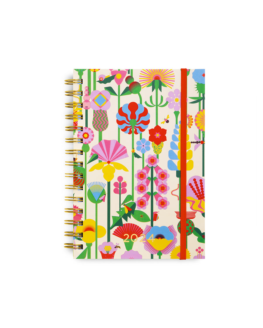 cream 12-month medium soft cover planner with colorful abstract floral print and red elastic closure