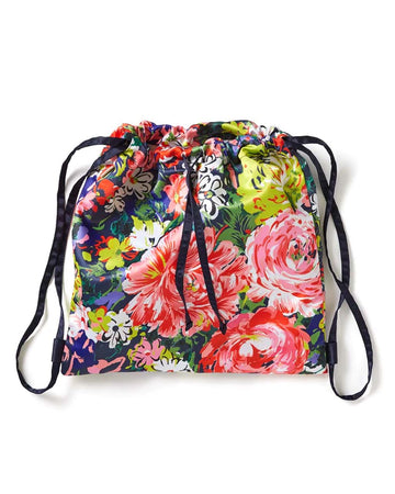 This drawstring backpack comes in a colorful floral pattern designed by Helen Dealtry.