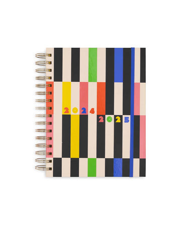 17-month planner with black and colorful vertical stripes 