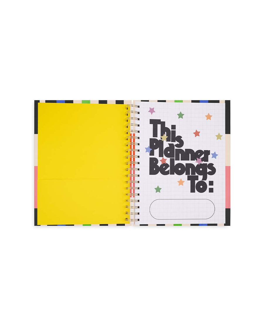 yellow interior pocket and 'this planner belongs to:'
