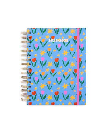 light blue 17-month planner with colorful tulip and star print
