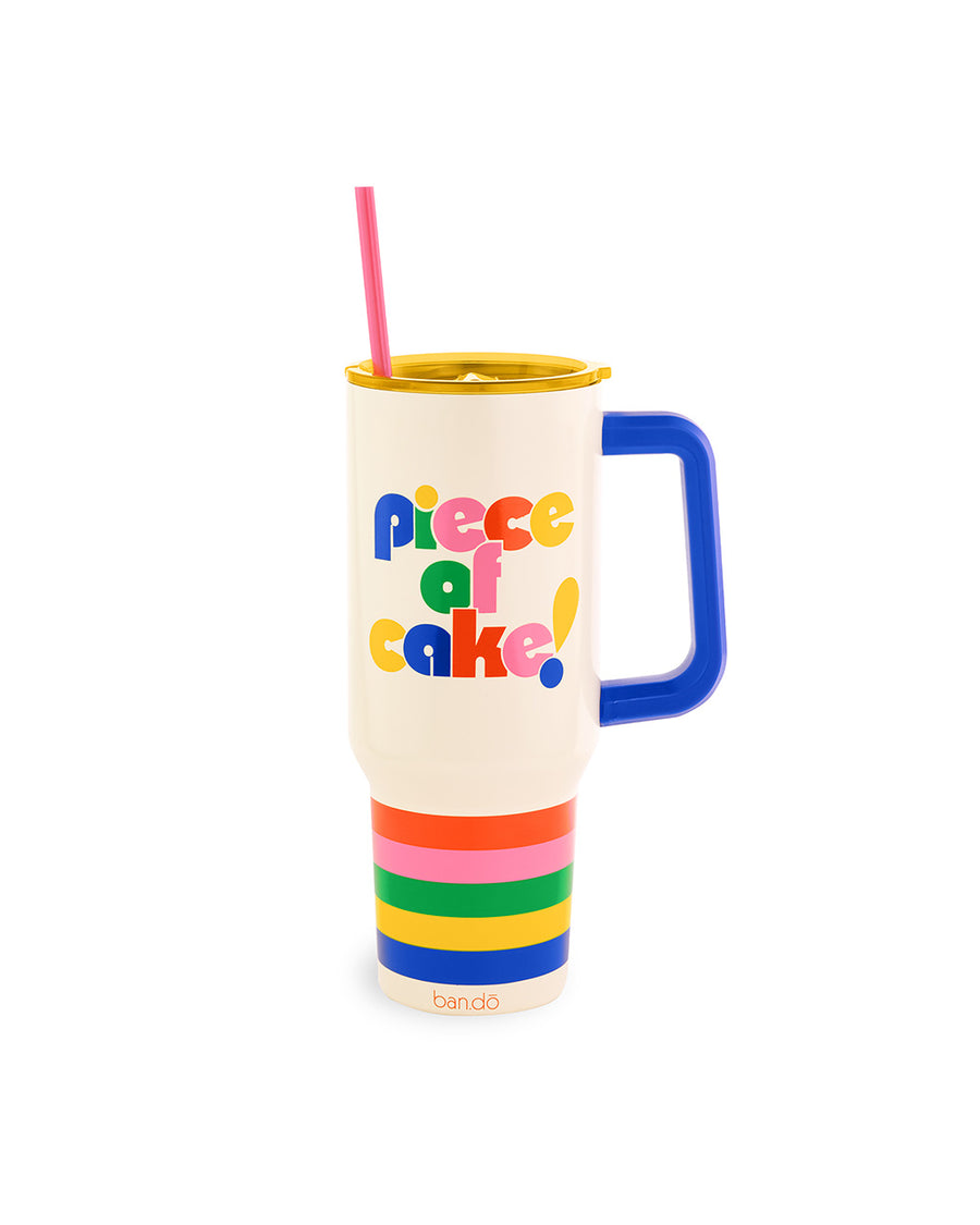 white mega 40 oz stainless steel tumbler with colorful 'piece of cake!' on the front