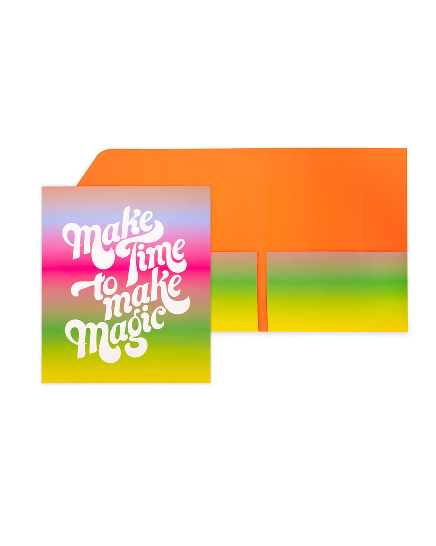 pocket folder with ombre rainbow ground and white 'make time to make magic' on the front