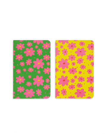 set of two notebooks with green ground and pink flowers and yellow ground with pink flowers