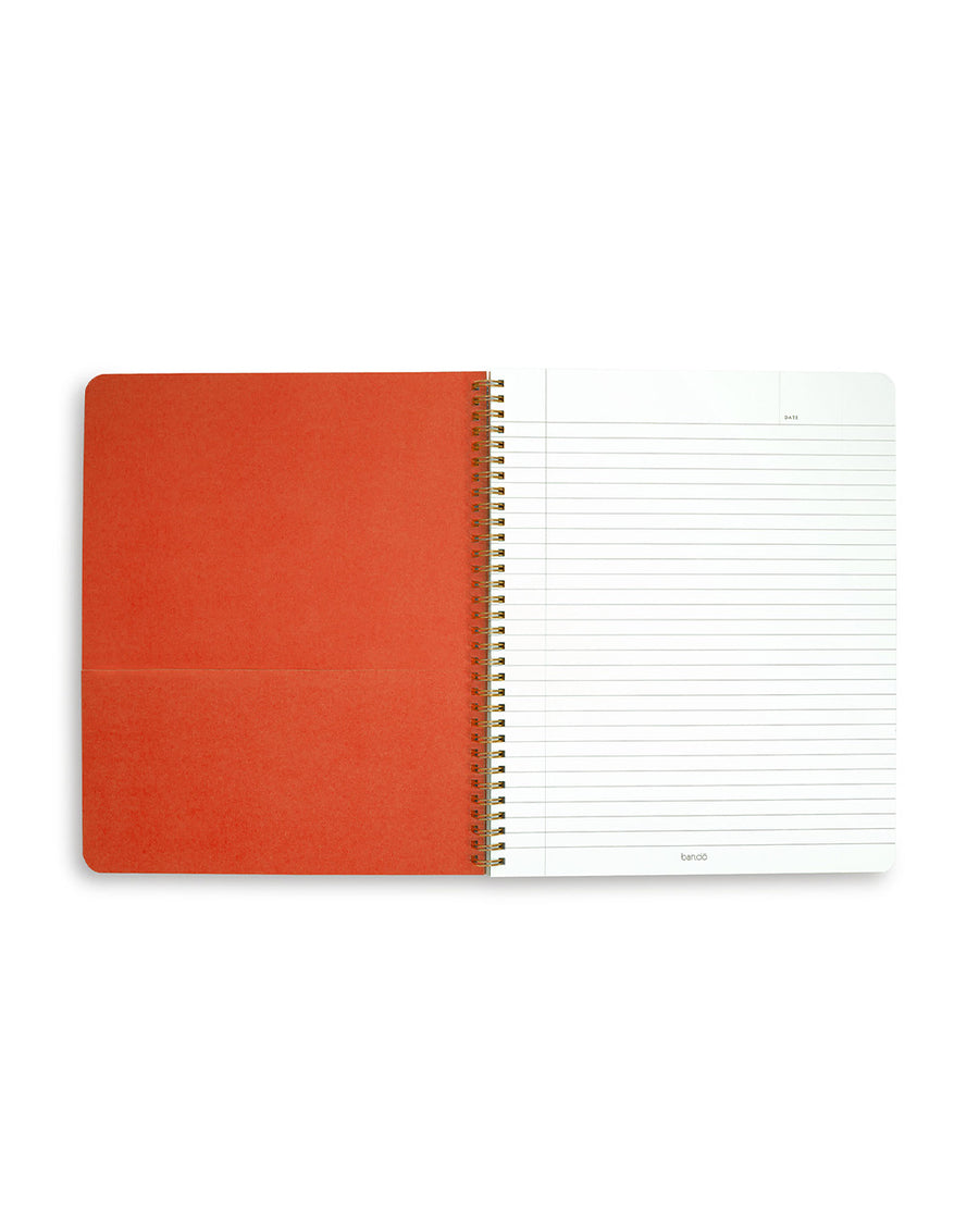 red pocket page and white lined paper