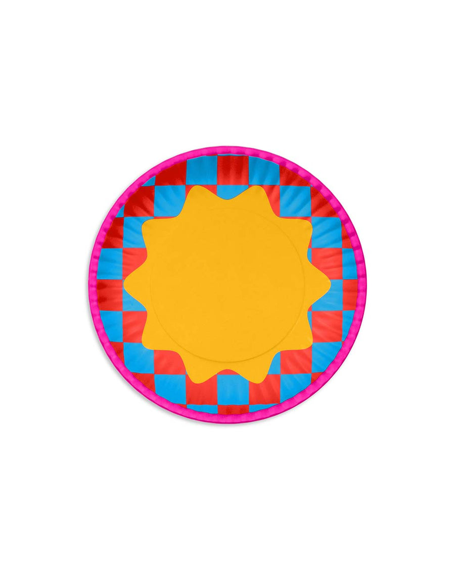 yellow starburst with red and blue checkered pattern