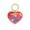 enamel heart shaped keychain that says 'i got smooched at the tunnel of love'