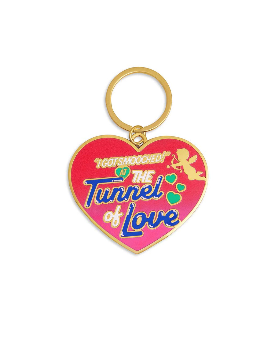enamel heart shaped keychain that says 'i got smooched at the tunnel of love'