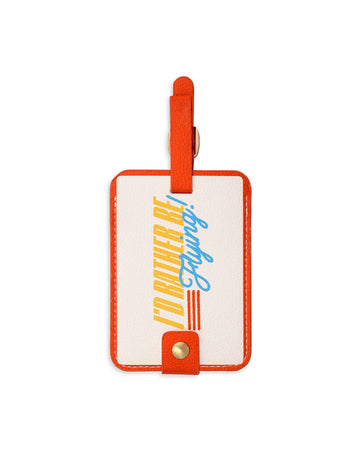 cream luggage tag with red trim and retro 'i'd rather be flying' across the front
