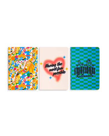 set of three rough draft notebooks: vibrant fairgrounds scene, air painted 'having the most fun possible' and emotional rollercoaster