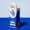 white and blue carton shaped ceramic vase with 'organic oat milk' across the front