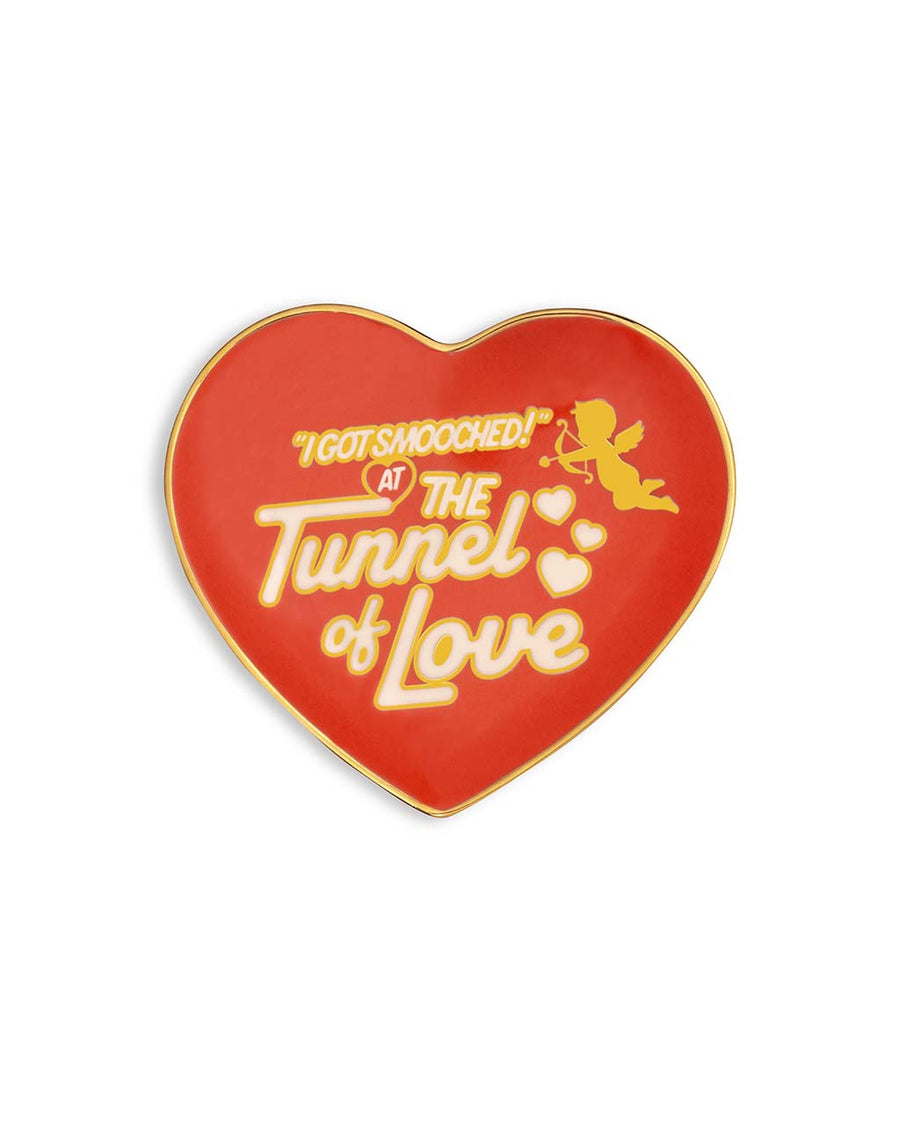 red heart shaped trinket tray that says 'i got smooched at the tunnel of love' in white and metallic gold