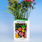 ceramic vase in the shape of wildflowers seed packet with flowers inside