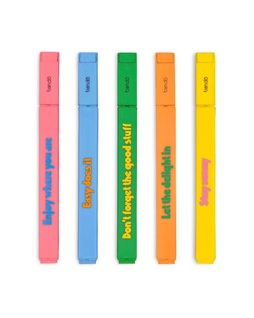 set of five neon highlighters with various positive sayings on them