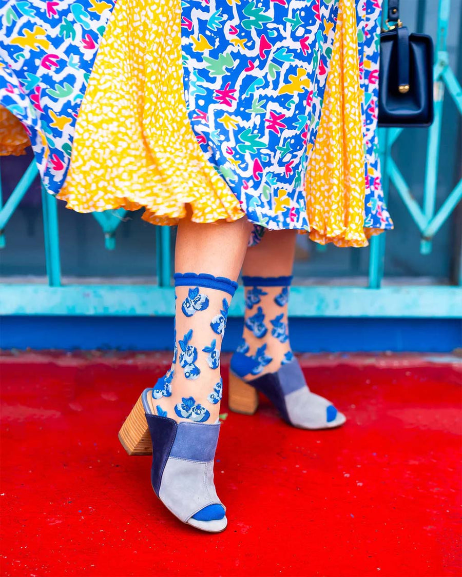 model wearing blue blueberry sheer socks with heels