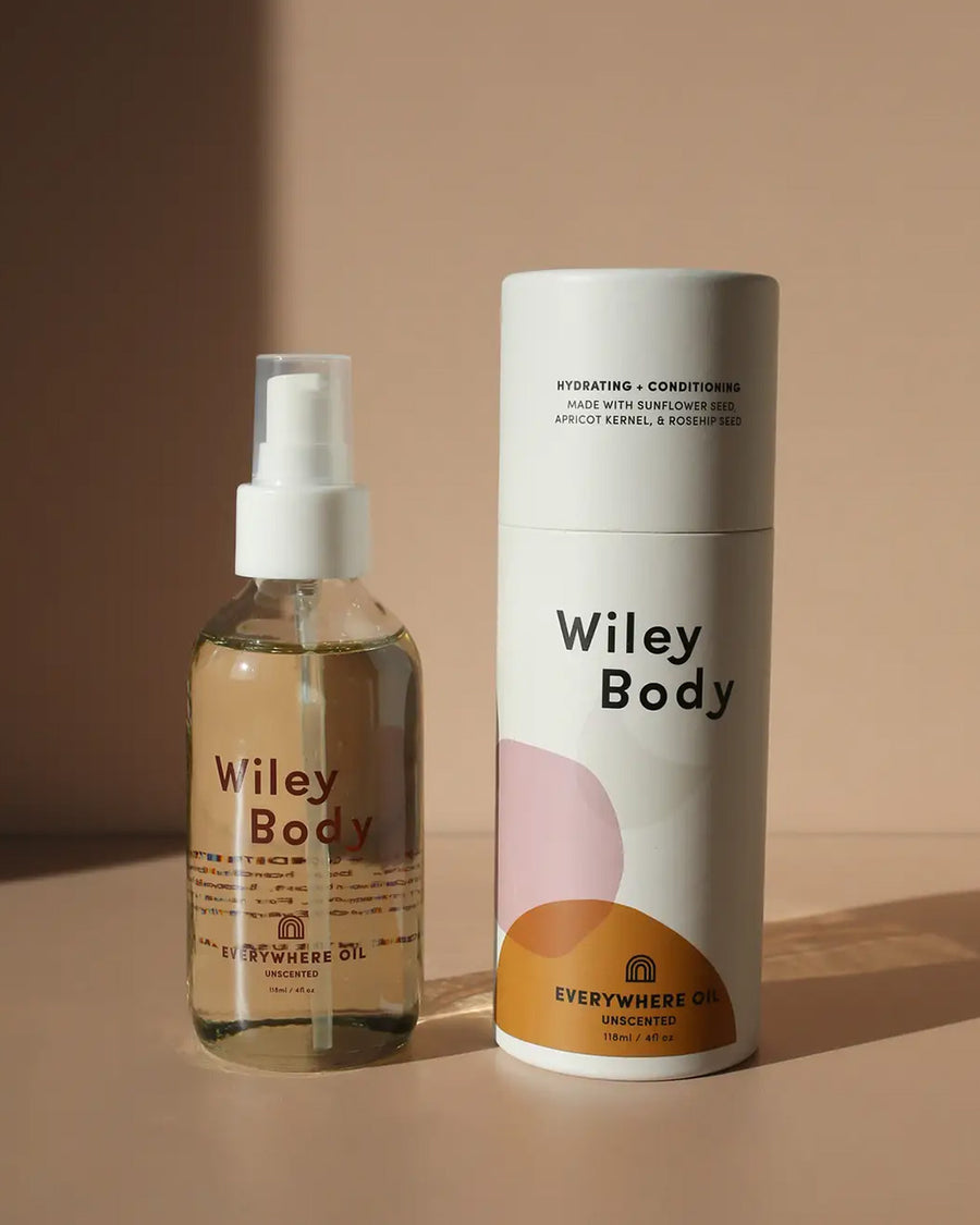 glass bottle with everywhere oil and box