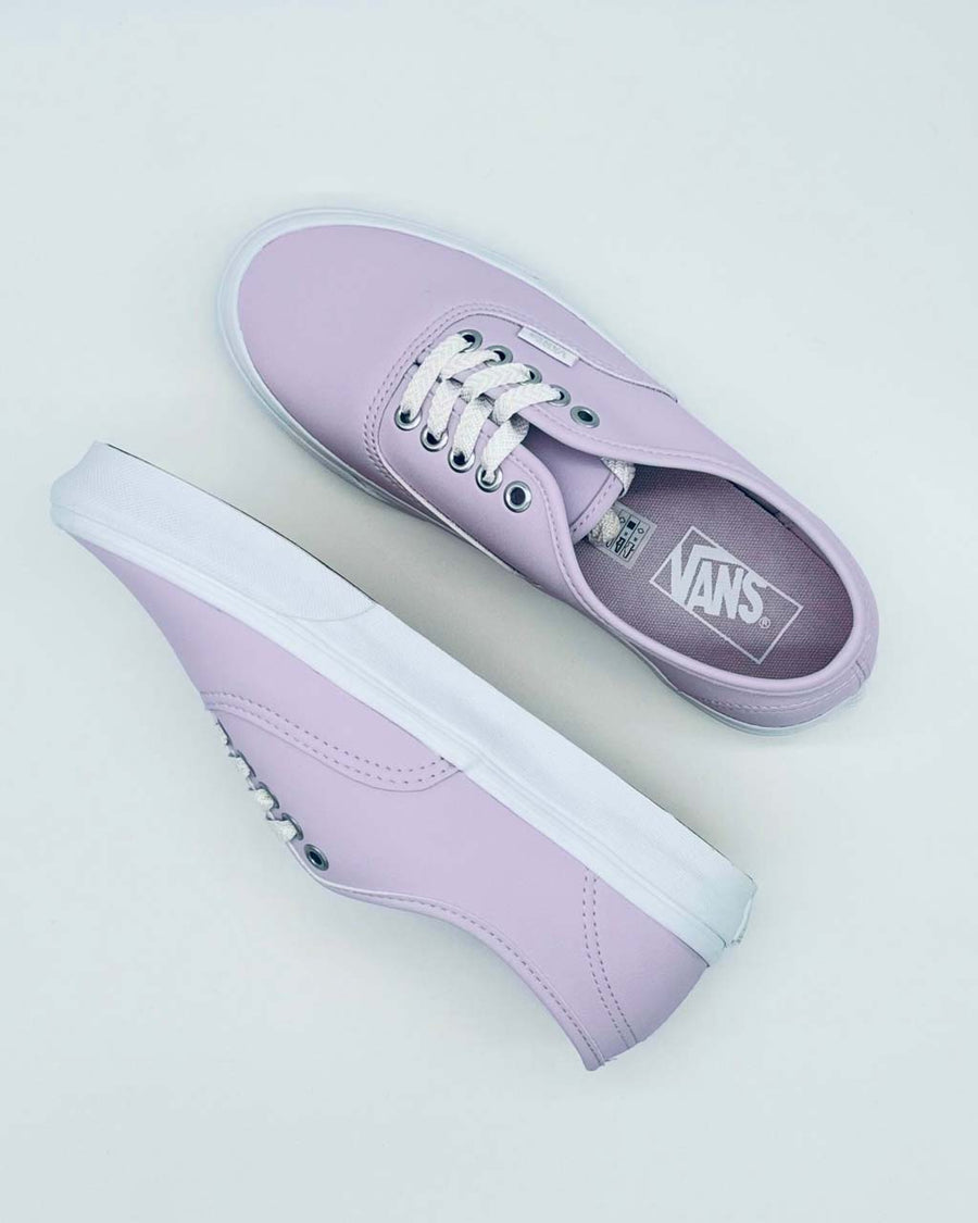 pair of lavender vans sneakers