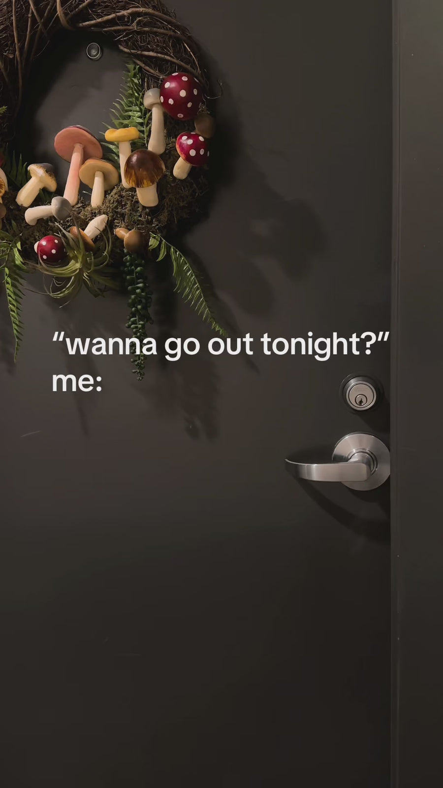 model putting blue and red book theme door hanger bookmarks on their door