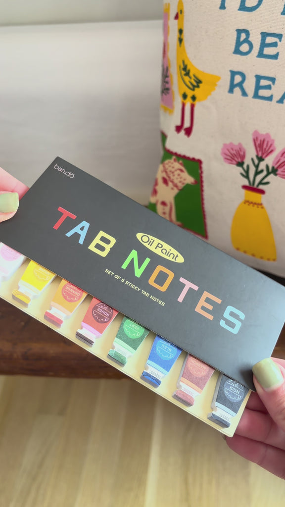 model showcasing oil paint shaped tab notes