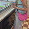 model using colorful star checker coin purse to buy ice cream