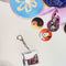 model showing how to use hit clip song keychain