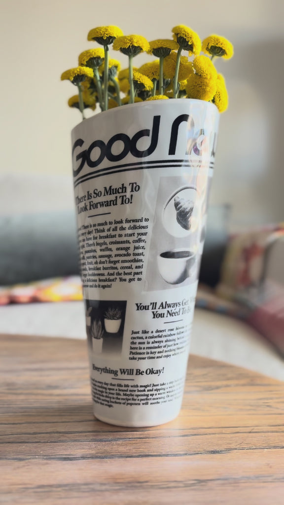 spinning newspaper vase