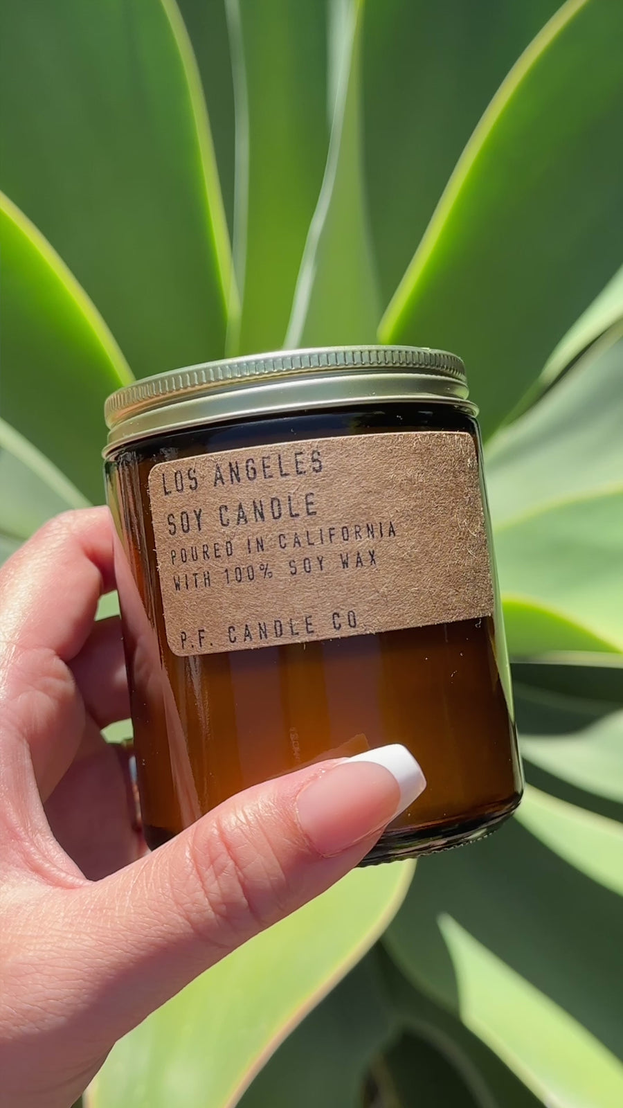model showcasing 'los angeles' soy candle