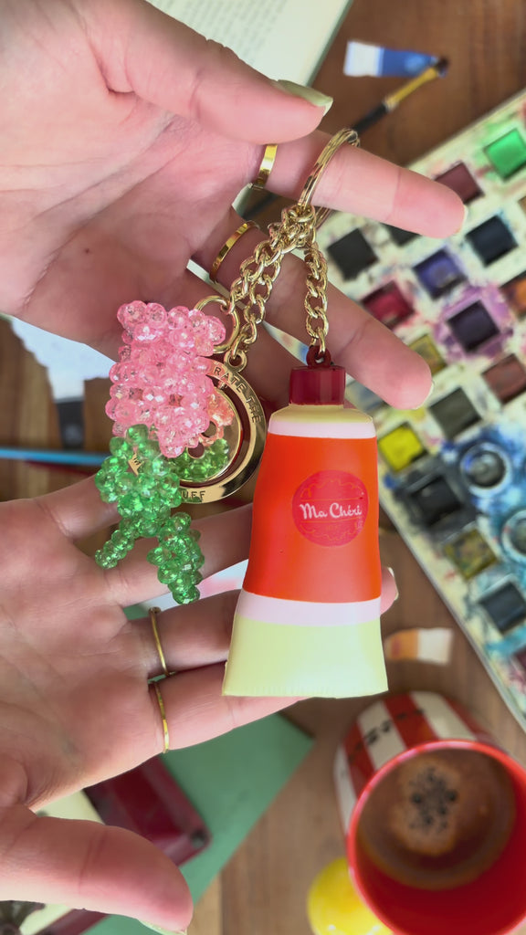 model showcasing colorful fidget keychain