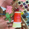 model showcasing colorful fidget keychain