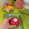 model squeezing pink jelly dessert de-stress ball