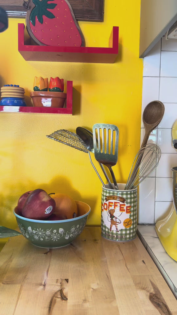 model showcasing orange juice carton and orange salt and pepper shakers