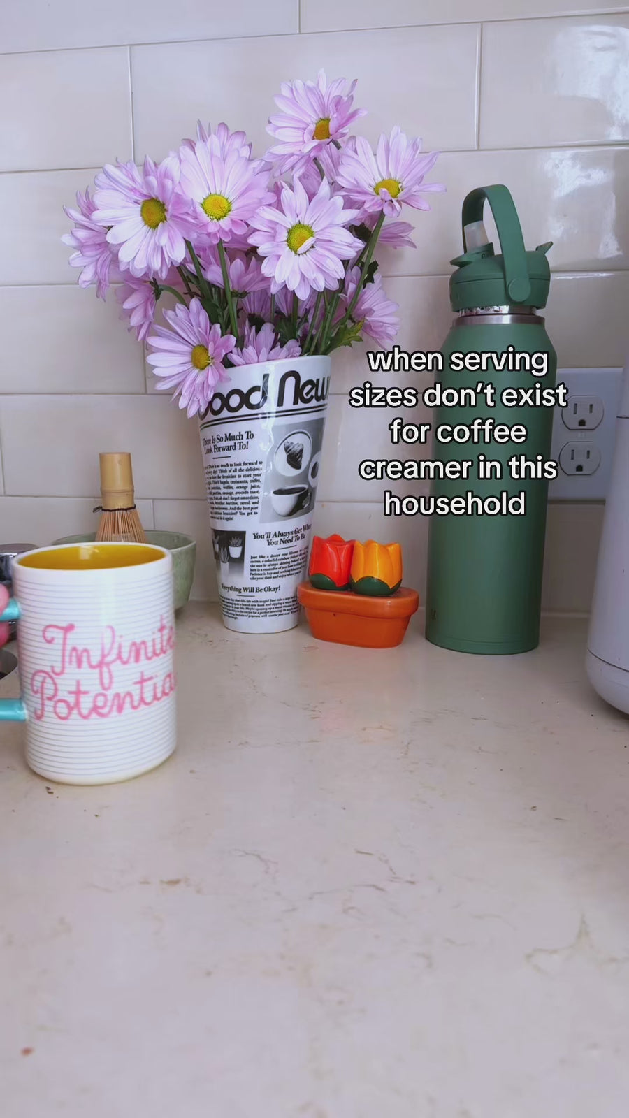 model putting creamer in infinite potential mug