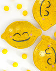 lemonhead shaped trinket dish with smiley face