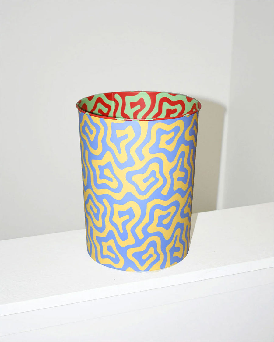 waste bin with colorful swirl design