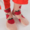 model wearing baggu crew socks with pink ground and strawberry print
